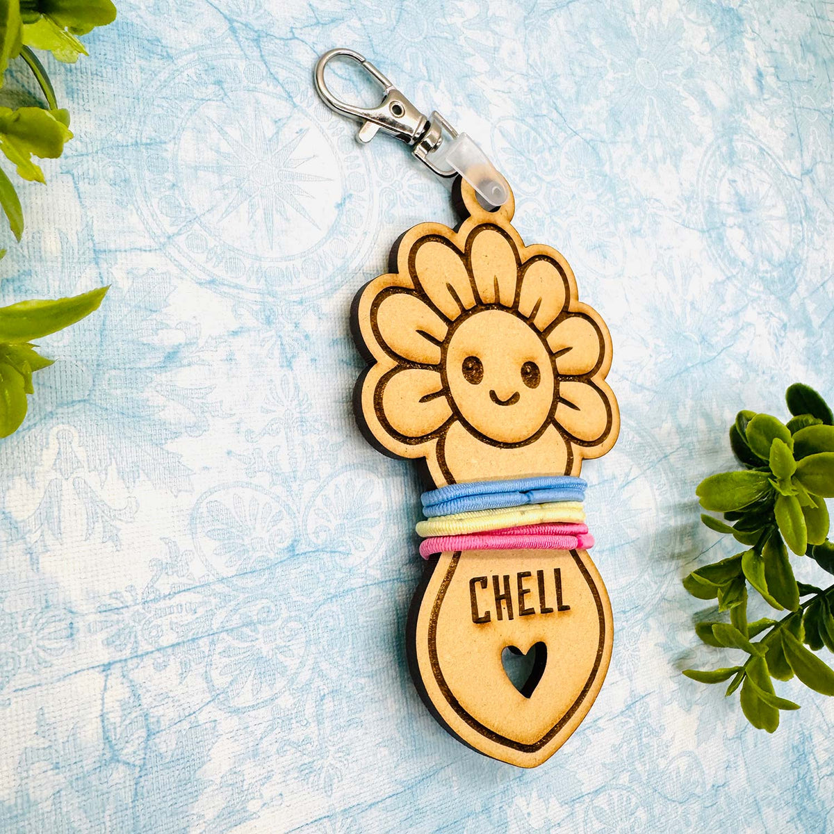 Fancy Flower Hair Tie Holder Keychain with Editable Text - Glowforge
