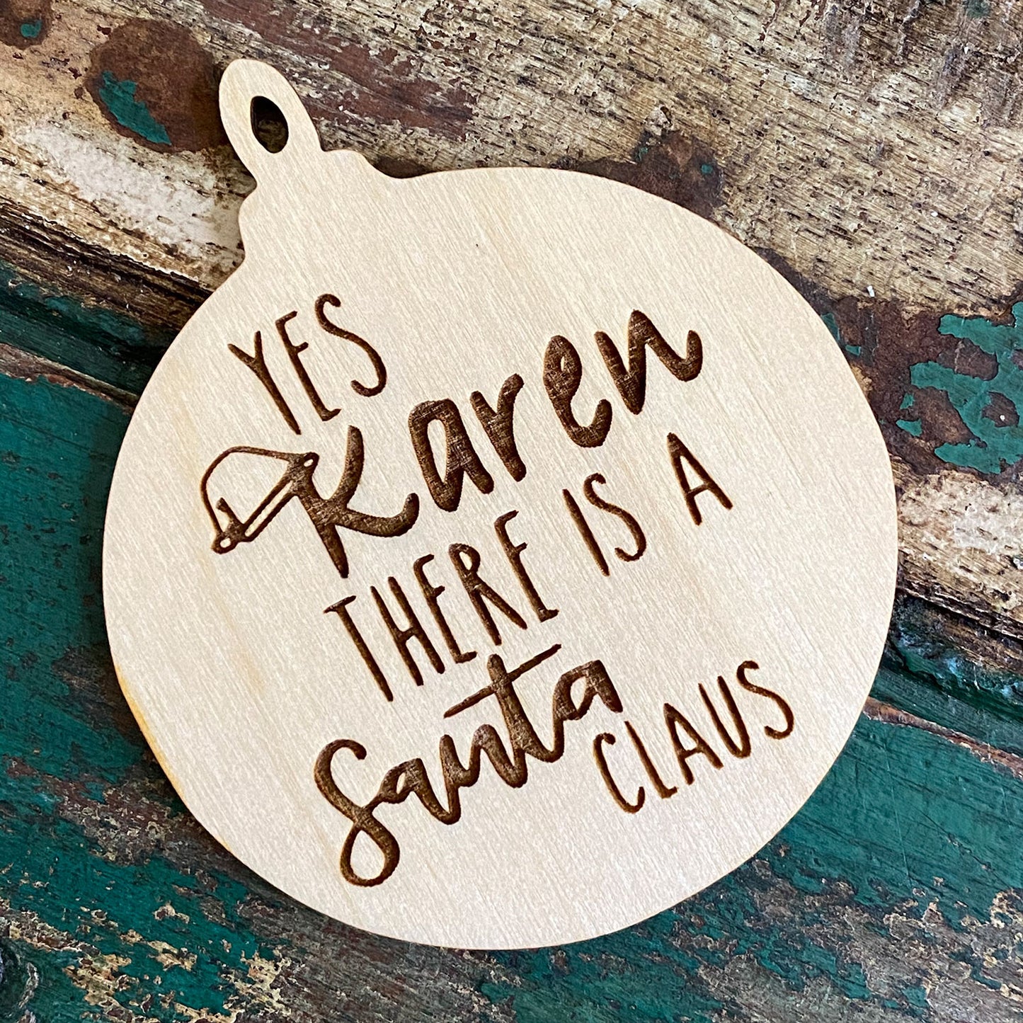 Yes, Karen, there is a Santa Ornament - Glowforge