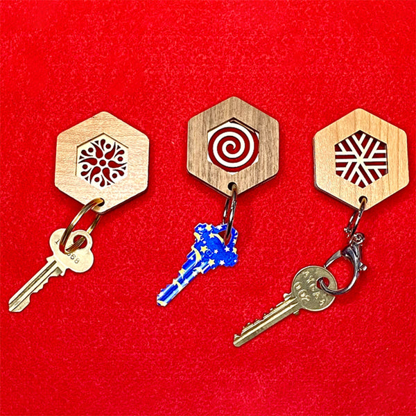 Hexagonal Key Fobs With Three Motifs Shop