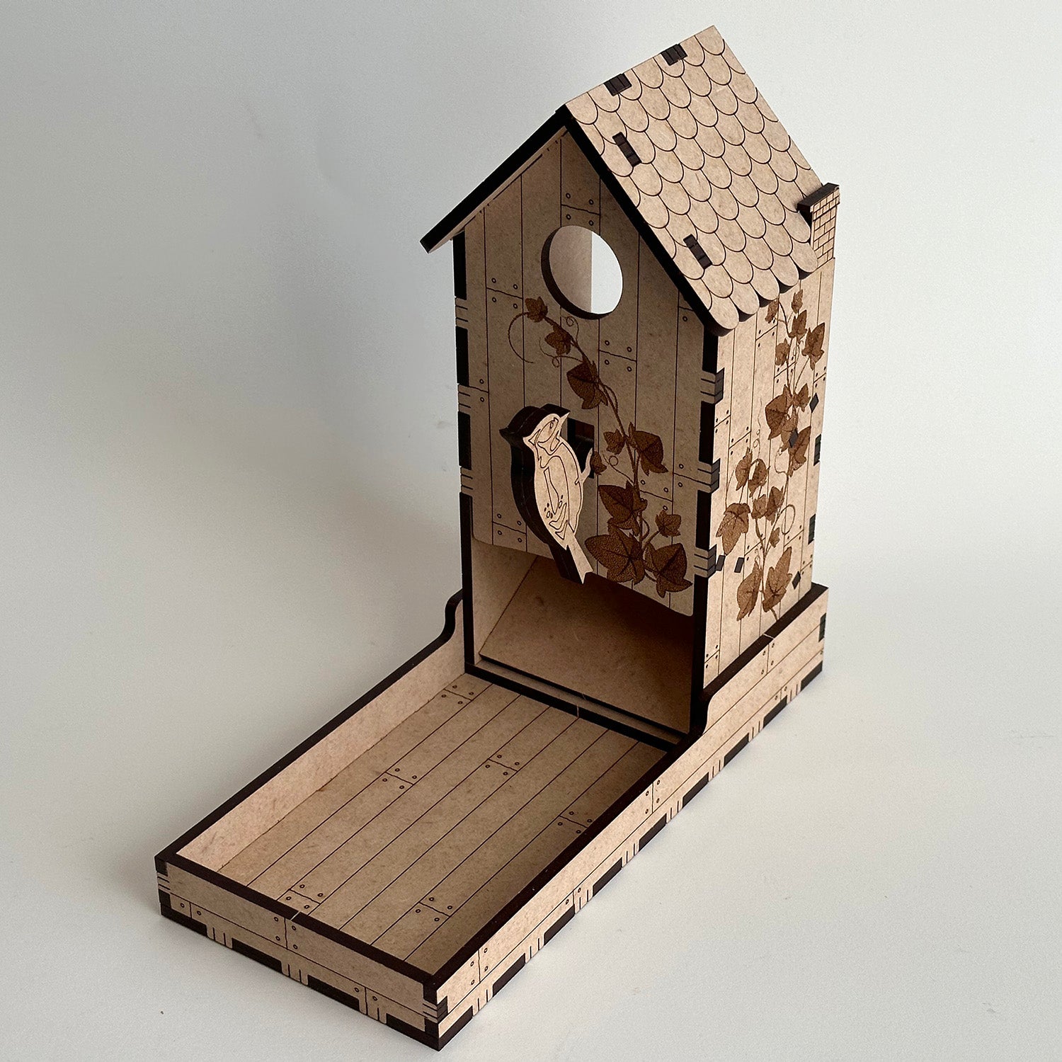 Wooden organizers have dice tower /bird house good dice tower and wood /