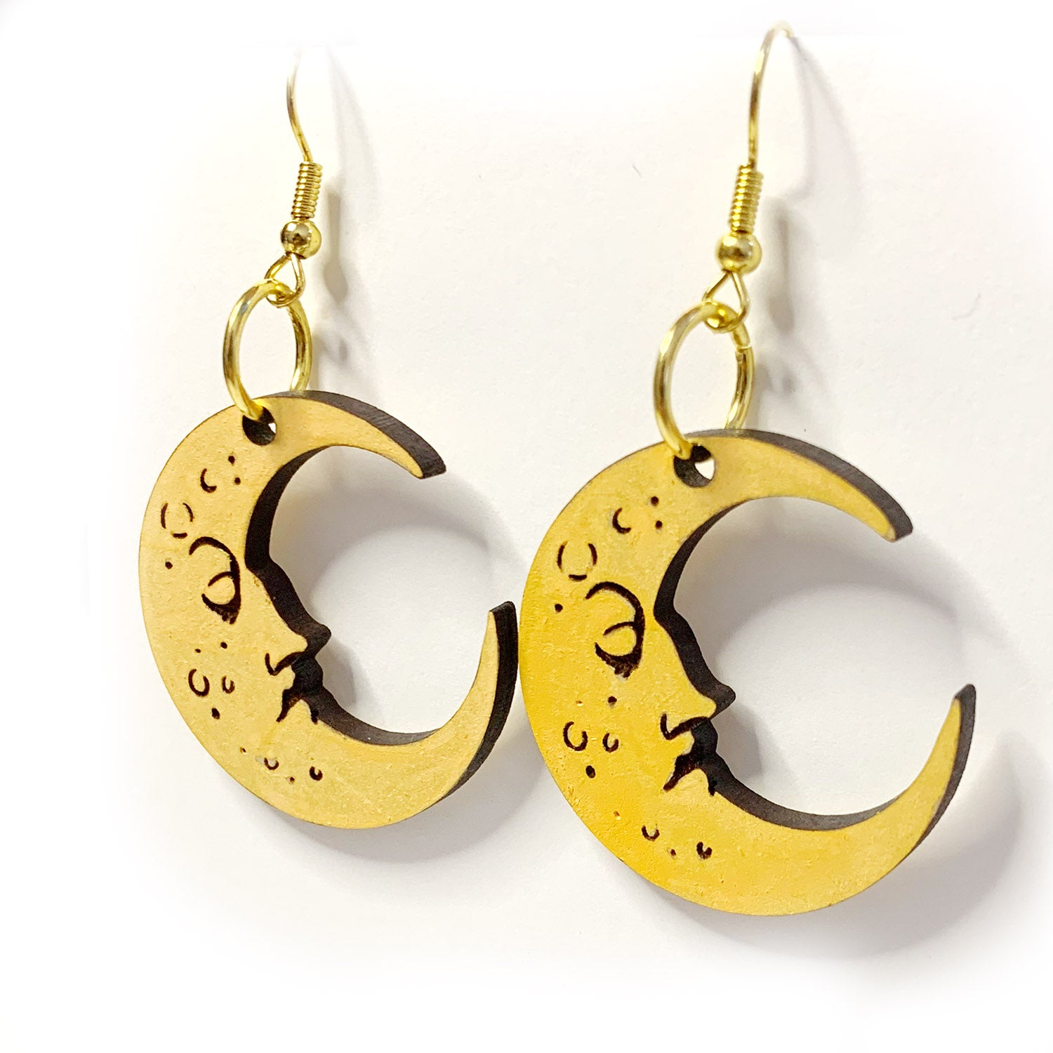 Crescent moon store dangle earrings