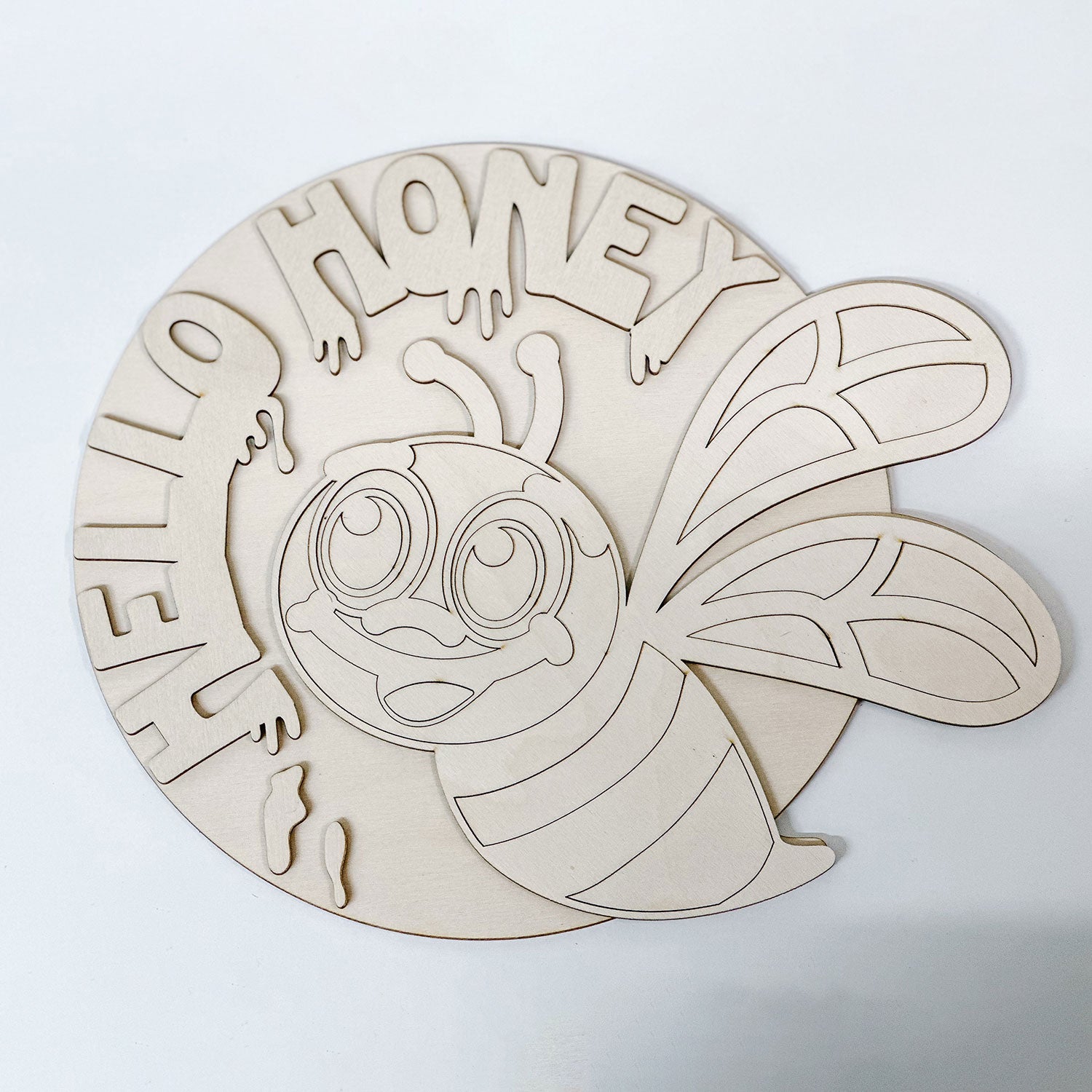 https://shop.glowforge.com/cdn/shop/files/HelloHoneyBeeDoorHanger-WelcomeSign-1square.jpg?v=1700424155&width=1500