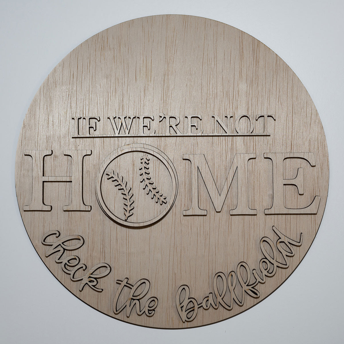 if-we-re-not-home-check-the-ballfield-baseball-round-sign-glowforge