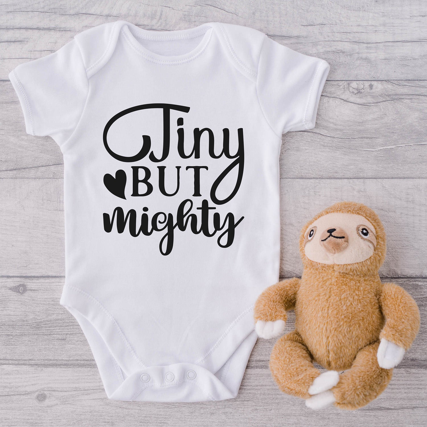 Tiny but cheap mighty onesie