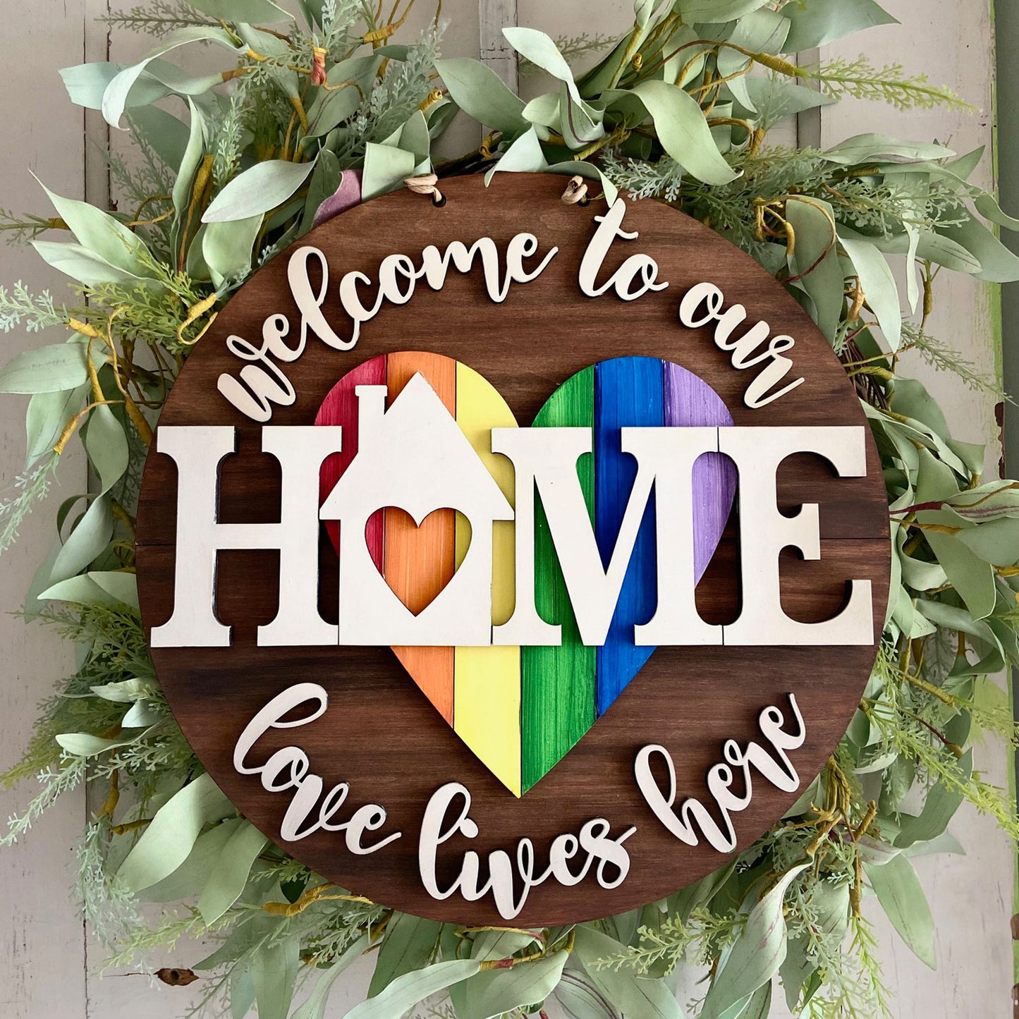 Welcome to Our Home Love Lives Here Pride Door Hanger Sign