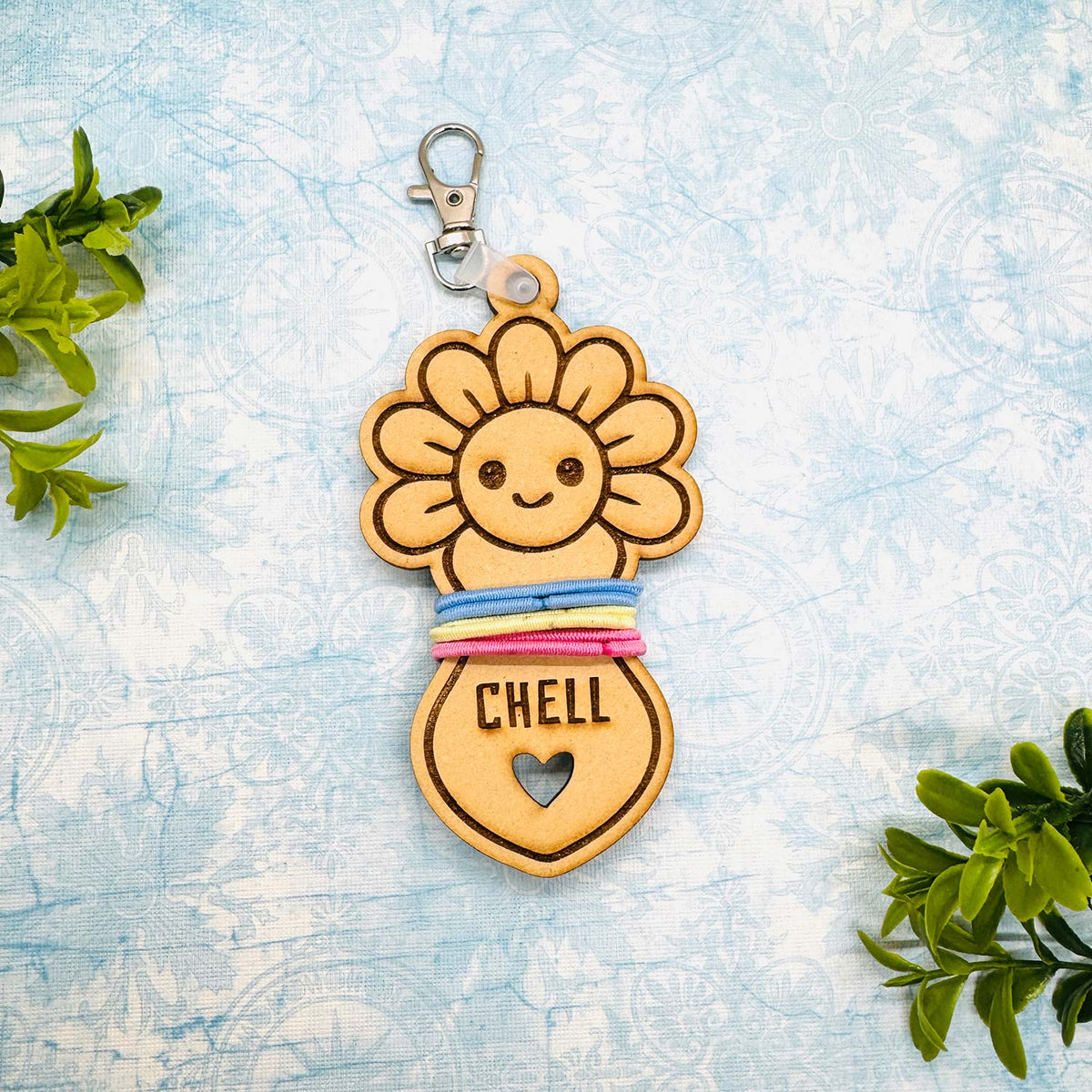 Fancy Flower Hair Tie Holder Keychain with Editable Text - Glowforge