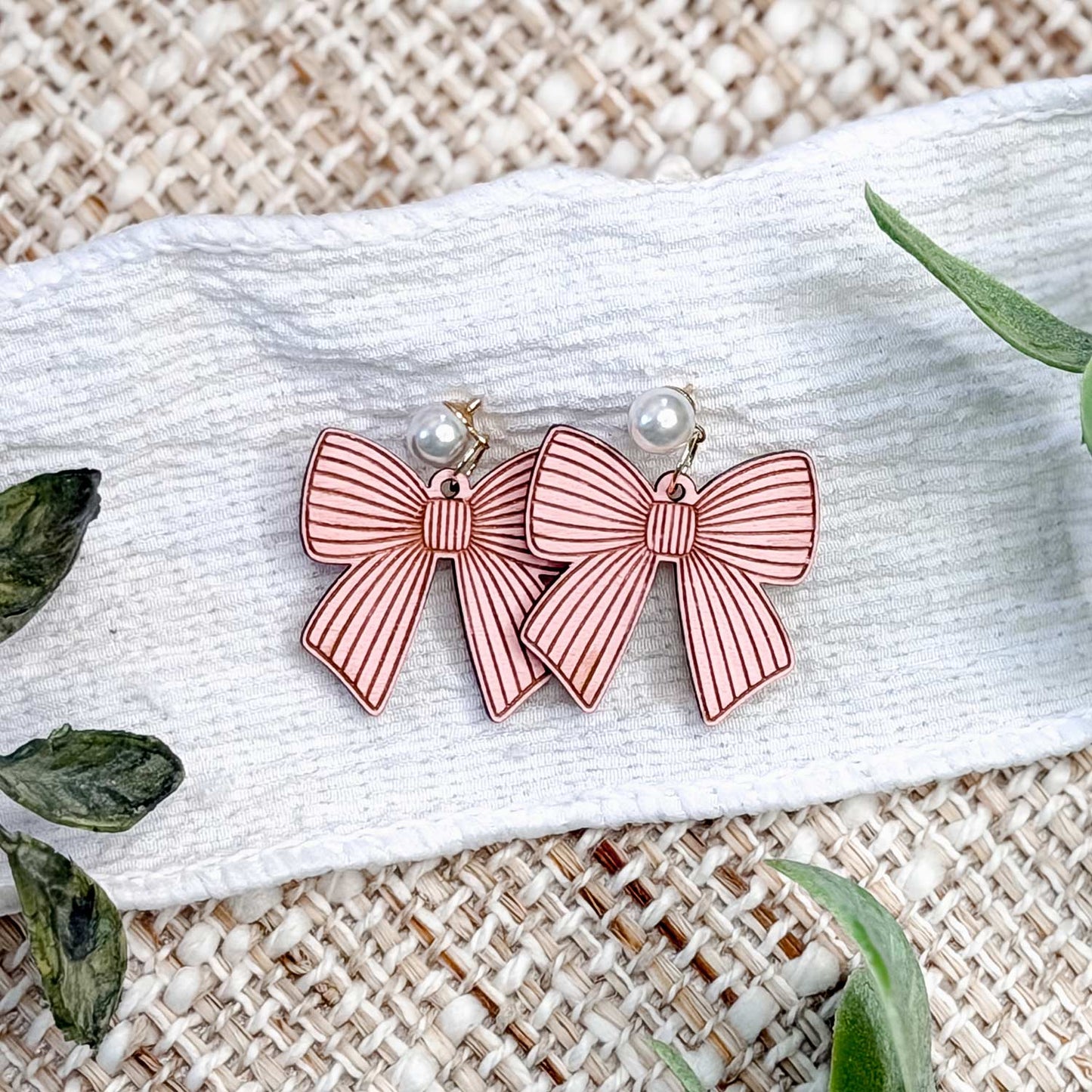 Lined Bow Earrings with Engraved Details - Glowforge