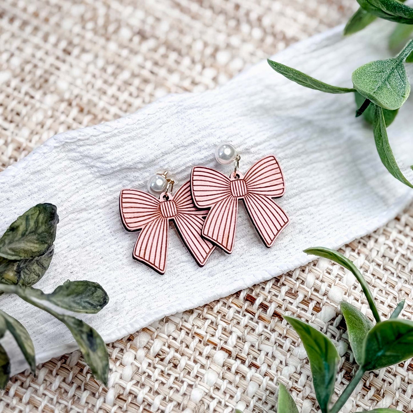 Lined Bow Earrings with Engraved Details - Glowforge