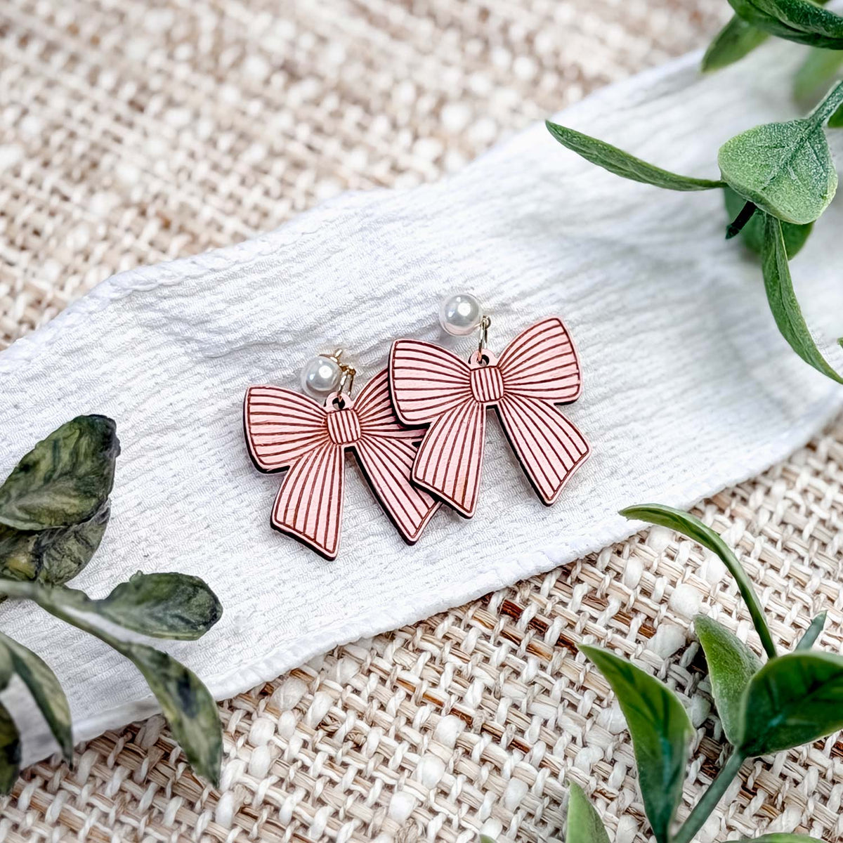 Lined Bow Earrings with Engraved Details - Glowforge