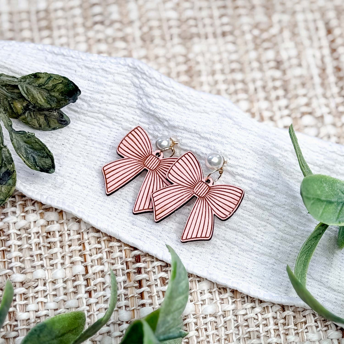 Lined Bow Earrings with Engraved Details - Glowforge