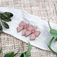 Lined Bow Earrings with Engraved Details - Glowforge