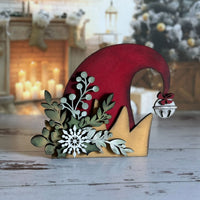 Mistletoe and Holly Adorned Elf Hat Shelf Sitter - Glowforge