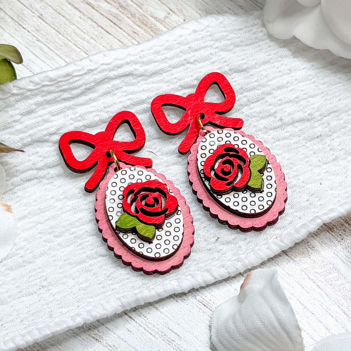 Romantic Rose Dangle Earrings with Bow Accent - Glowforge
