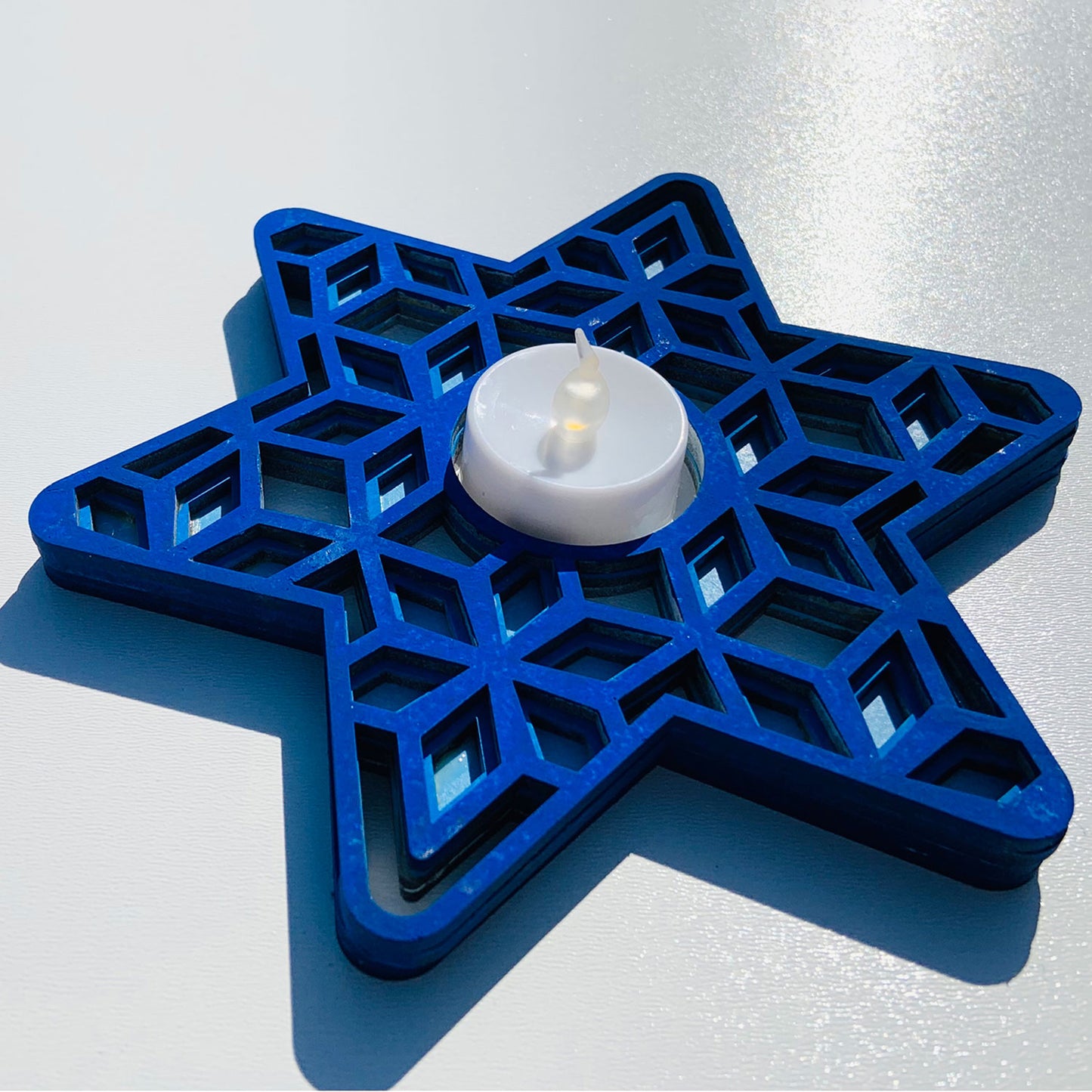 Layered Star Tea Light Candle Holder with Geometric Shapes