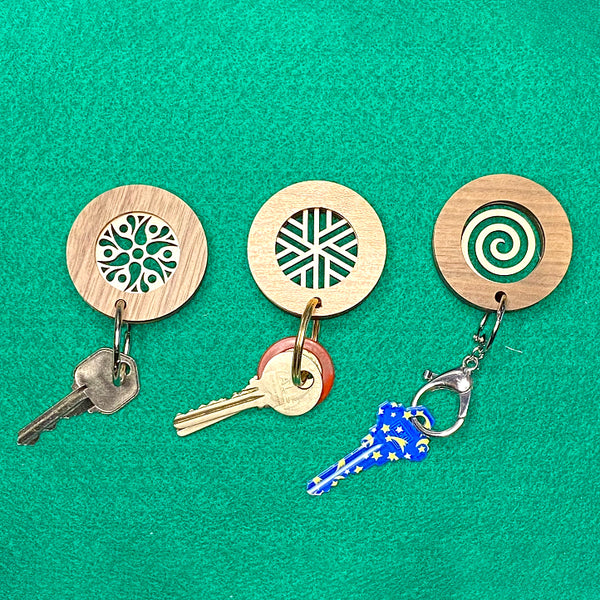 Round Key Fobs With Three Motifs Shop